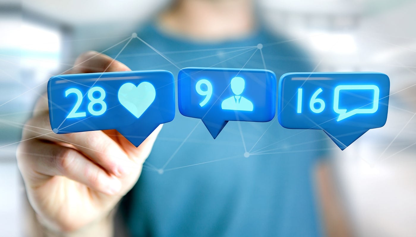 man checks the analytics of his facebook ad