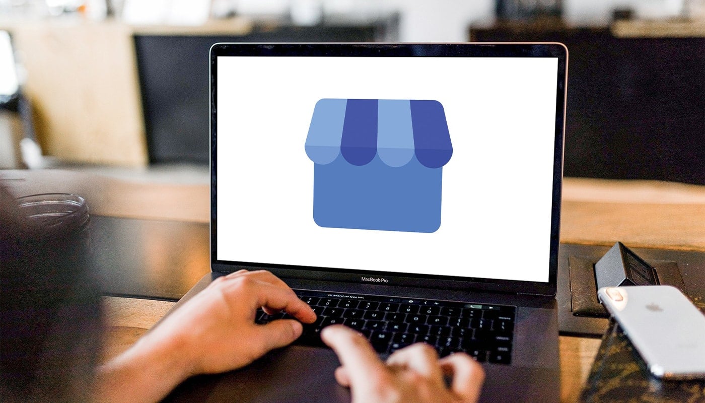 woman accesses gmb listing on laptop during covid-19 outbreak